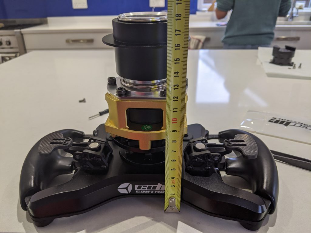 Cube Controls wheel mounted on a Fanatec Podium Hub