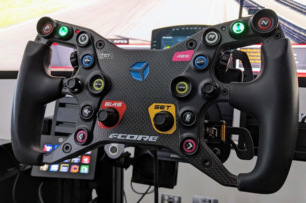 Cube Controls F-Core sim racing steering wheel - front view - mounted on rig - G-Performance